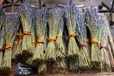 Bouquets of dry lavender or lavandin blossoms for sale on the market of Aix en Provence, Franceの写真素材