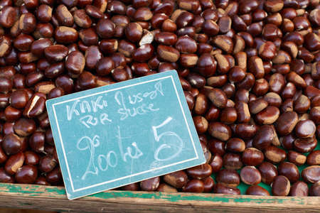 Chestnuts for sale on Provence market, South France, Luberon regionの写真素材