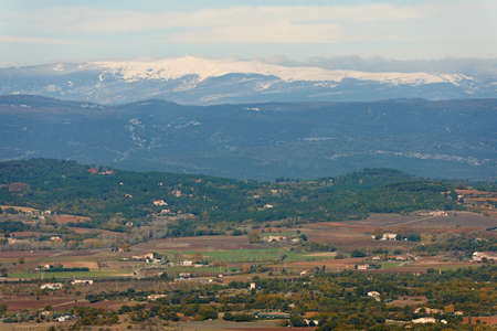 General landscape view from Luberon region with snow ridges of Alpes, Provence, France in winter seasonの写真素材
