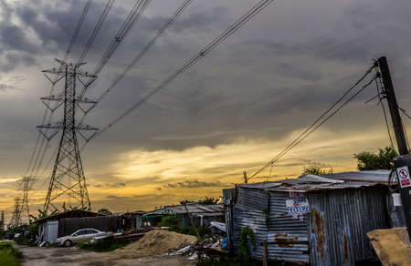 Urban ghetto house village canal side in Bangkok Thailand.の写真素材