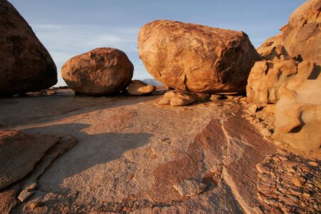 Large granite boulders at sunrise, Brandberg mountain, Namibiaの写真素材