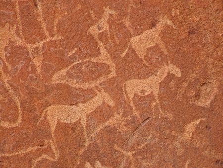 Rock engravings of African wildlife subjects, Twyfelfontein archaeological site, Namibiaの写真素材