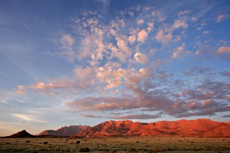 Desert landscape at sunrise, Brandberg mountain, Namibia	の写真素材