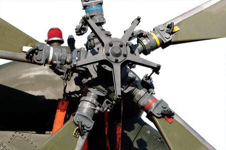 Close-up view of  the tail rotor of a military helicopter on white	