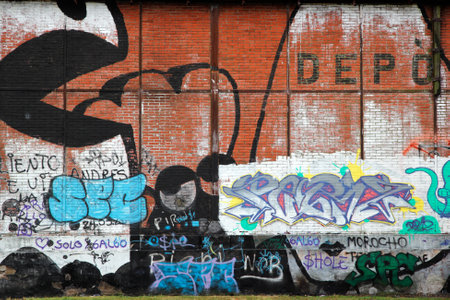 Rosario, Argentina, April 2, 2011 - Colorful and artistic graffiti used to decorate unattractive walls of buildings in the cityのeditorial素材
