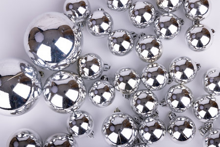 An aerial perspective showing a chaotic arrangement of Christmas ornaments. Their varied sizes and bright colors create a festive atmosphereの写真素材