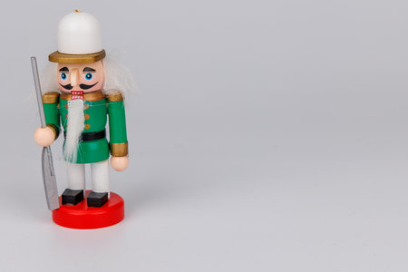 This elegant wooden nutcracker, with its original hair and intricate details, adds a festive touch to any Christmas decorationの写真素材