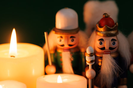 An elegant nutcracker with original hair is beautifully complemented by lit candles and colorful...