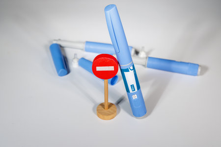 Medical flat lay with semaglutide pens and accessories for diabetes therapyの写真素材