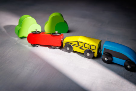 Toy train with a derailed carriage. Perfect for conceptual imagery about failure, risk management and the urgent need for railway safety measures.の写真素材