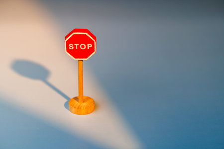 Wooden sign over a gradient surface as a symbol for willpower. Ideal for representing the act of quitting toxic relationships or bad routines now.の写真素材