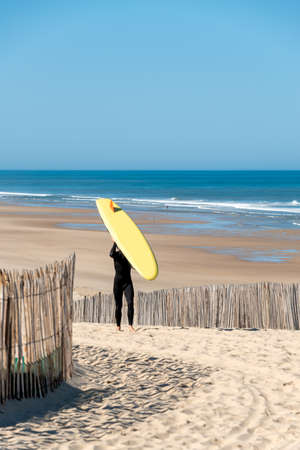 Hourtin, Gironde, France. Surfer on the beachの写真素材