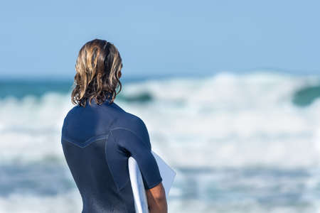 Lacanau, Gironde, France. Surfer on the beachの写真素材