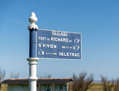 Medoc: old direction sign for Port of Richard on the Gironde estuaryの写真素材