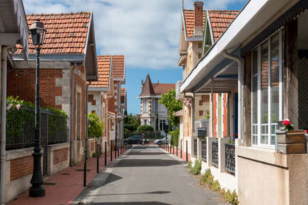 SOULAC, FRANCE - 05-27-2021: a typical alley in the center of the old town, with its 19th century houses and villasのeditorial素材