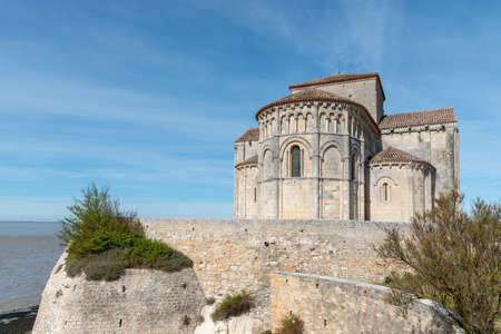 Talmont-sur-Gironde, in Charente-Maritime, France. The church of Sainte-Radegonde, 12th century, classified as a historical monumentの写真素材