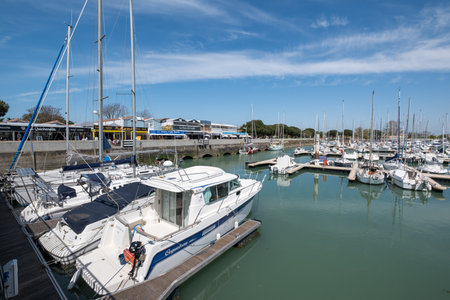 Saint-Georges-d'Oleron, France - April 20 2023. The marina in Boyardville, a district of Saint-Georges-d'Oleron, is lined with small restaurants popular with tourists.のeditorial素材