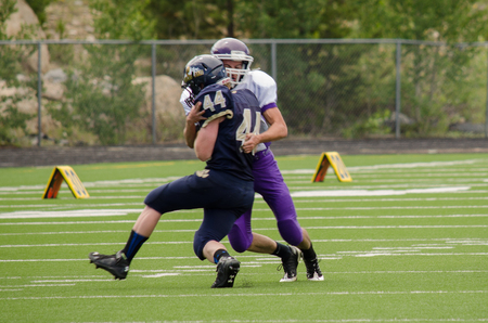 Nederland, CO: August 30, 2014- Elbert High School vs Nederland High Schoolのeditorial素材