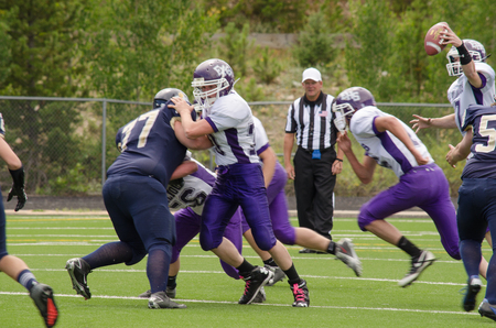 Nederland, CO: August 30, 2014- Elbert High School vs Nederland High Schoolのeditorial素材