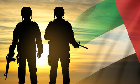 Silhouette of a soldier on background of the sunrise and UAE flag. Concept for Commemoration Day, Martyrs Day. eps10 vectorのイラスト素材