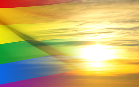 Rainbow flag on background of sunsetのイラスト素材