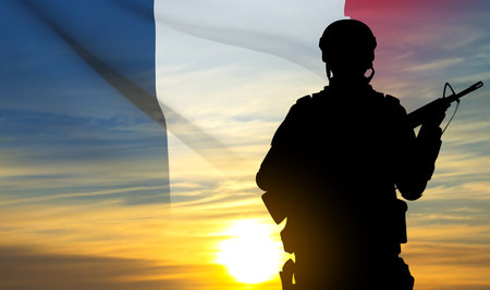 Silhouette of a French soldier on background of sunsetのイラスト素材