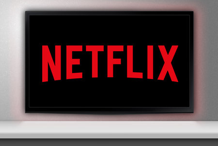 Netflix logo on TV. Netflix specializes in and provides streaming media and video-on-demand online. Moscow, Russia - February, 2023のeditorial素材