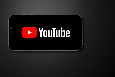 Youtube logo on the smartphone screen. Moscow, Russia - March, 2023のeditorial素材