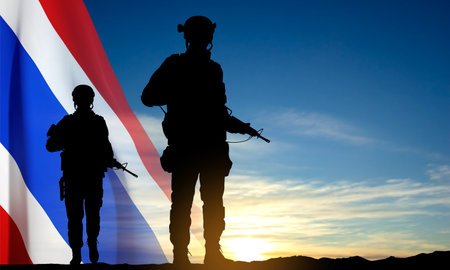 Silhouettes of a soldier with Thai flag against the sunset. Patriot concept. eps10 vectorのイラスト素材