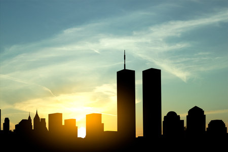 New York skyline silhouette with Twin Towers and against the sunset. 09.11.2001 American Patriot Day bannerの写真素材