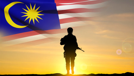 Silhouette of a soldier with flag of Malaysia