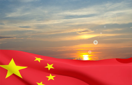 Flag of China against the sunset. National day of the People's Republic of China. 1st October.の写真素材
