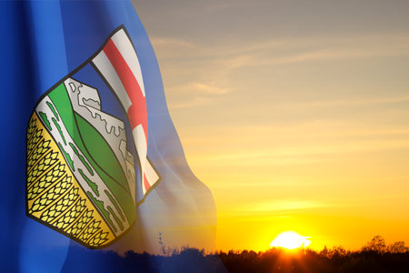 Flag of Alberta against the sunset - Province of Canada
