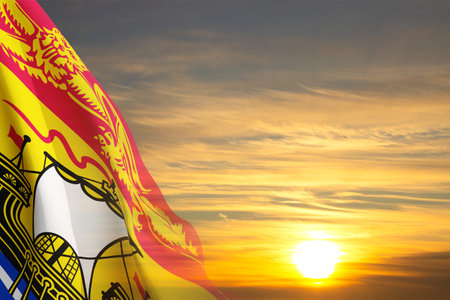 New Brunswick flag against the sunset. Province of Canadaの写真素材