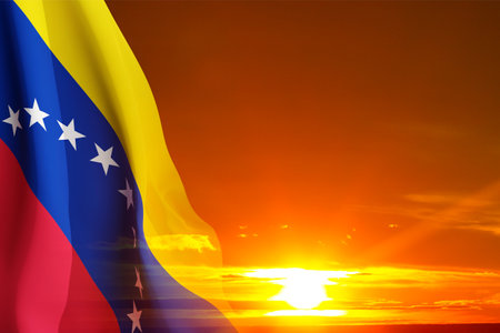Flag of Venezuela against the sunsetの写真素材