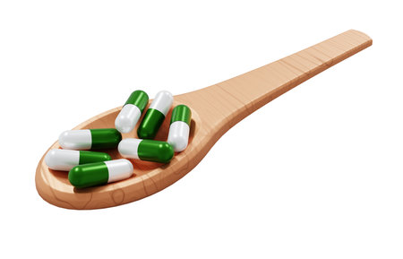 Pills on wooden spoon on white background. Healthy and medicine concept. Pharmaceutical medicine pills or dietary supplement healthcare product. 3d-renderingの写真素材