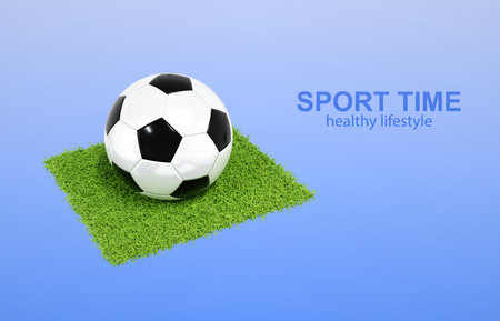 Soccer ball on green field on blue background. 3d-renderingの写真素材