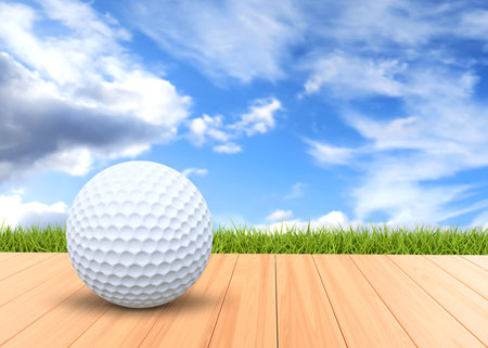 The golf ball on wood floor on background with grass and sky. 3d-renderingの写真素材