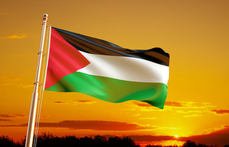 Flag of Palestine against the sunset skyの写真素材