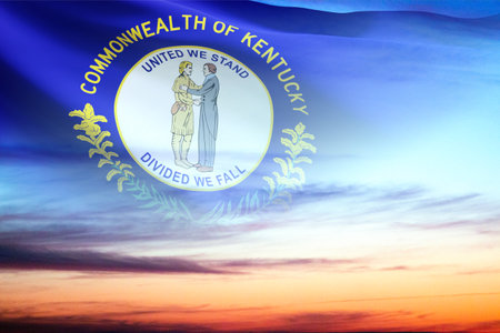 Flag of Kentucky - US state - against the sunset