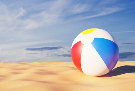 A vibrant beach ball rests on golden sand against a bright blue sky, evoking the essence of summer and the beach. 3d-renderingの写真素材