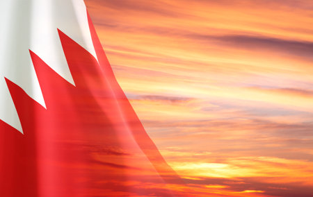 Flag of Bahrain against the sunset. National Holidays conceptの写真素材