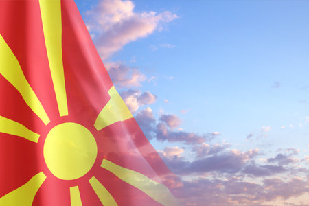 Flag of North Macedonia against the sunset skyの写真素材