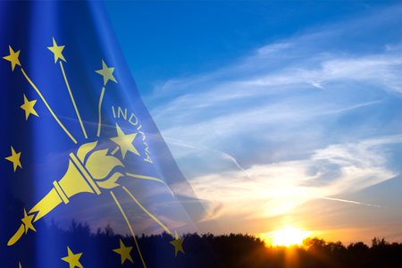Flag of Indiana against the sunset. U.S. stateの写真素材