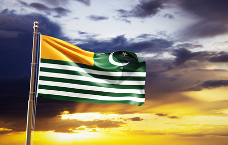 Flag of Azad Kashmir against the sunset. Kashmir Solidarity Day concept