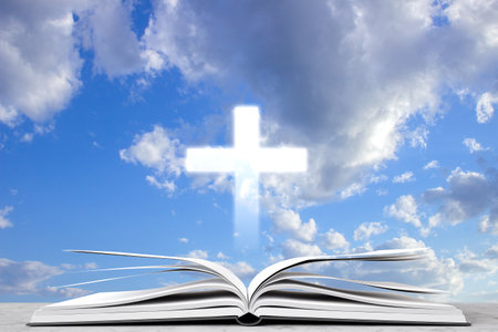 Open book with cross against the cloudy sky. Religious concept. 3d-renderingの写真素材