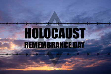Holocaust Remembrance Day. Silhouette barber wire and star of David on a sunsetの写真素材