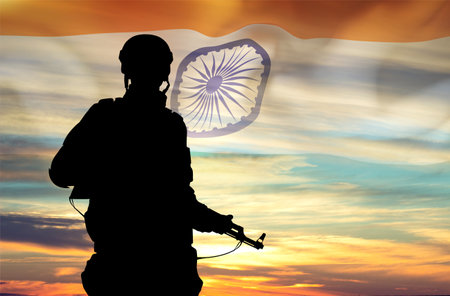 Silhouette of a soldier against the sunset with India flag. National Holidays conceptの写真素材
