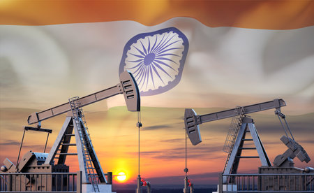 Oil pumpjacks against the sunset with India flag. Oil industry conceptの写真素材