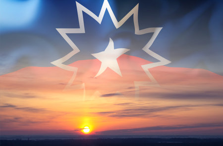 Juneteenth Flag against the sunsetの写真素材